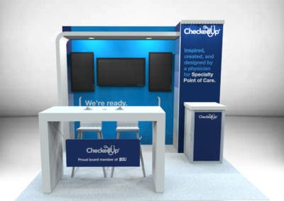 10 foot by 10 foot exhibit rental structure wth front charging counter, storage counter, and space for monitor displays.
