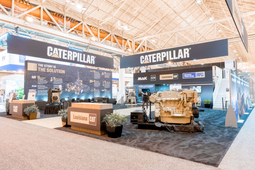 A massive exhibit featuring hardware on display and meeting spaces to talk with staff, perfect for a show like the National Hardware Show in Las Vegas.