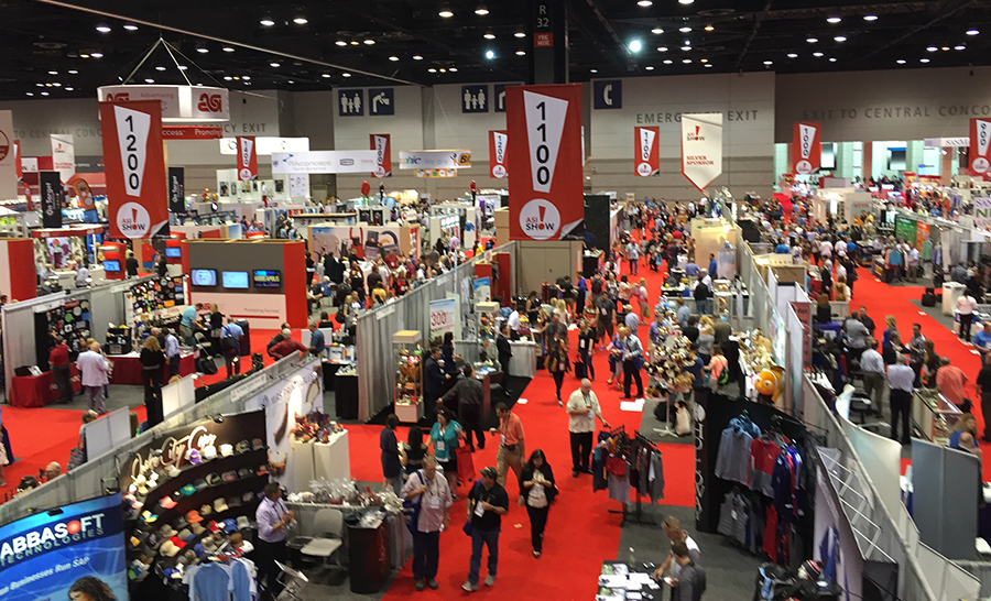 Attendees at ASI Show 2015 in Chicago walk the aisles of exhibits at McCormick Place Convention Center.