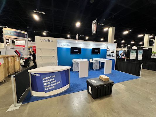 This exhibit for Wildix created by Cardinal Expo demonstrates what an inline booth is.