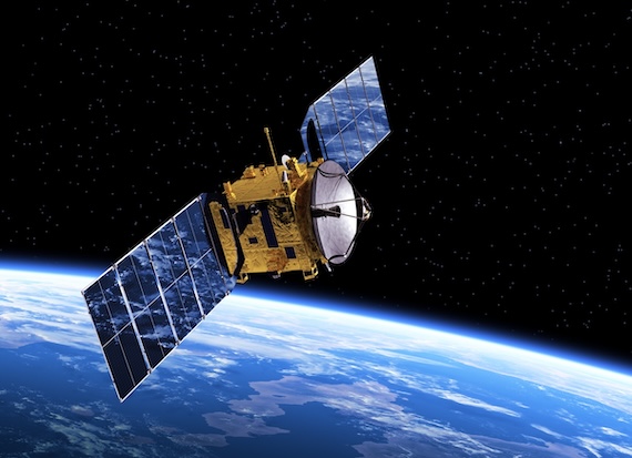 A satellite orbiting the Earth, which is an example of the kind of technology you might see at SATELLITE Conference and Exhibition