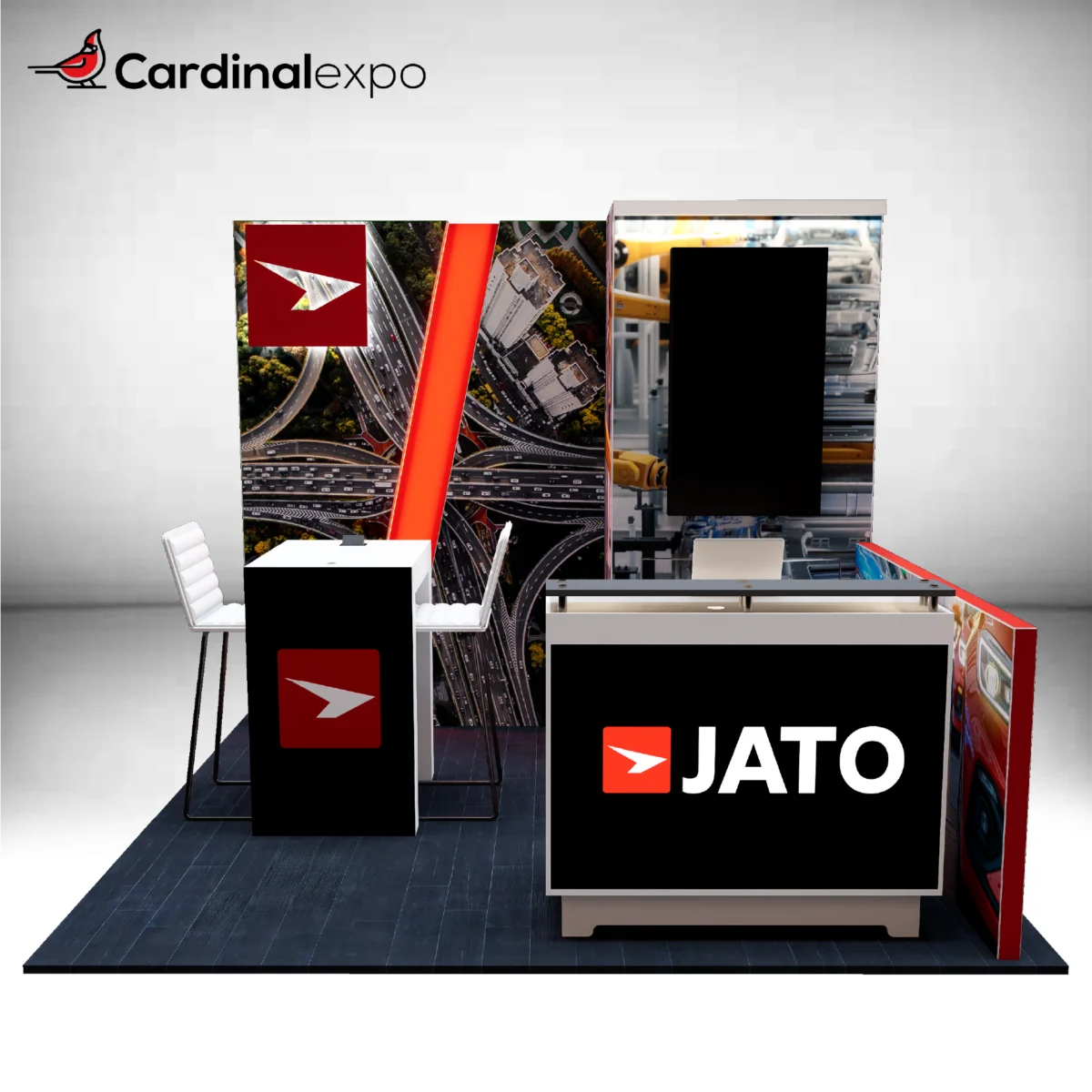 Frontal view of a 10x10 exhibition booth featuring a reception counter, vertical monitor, tower, and meeting table.