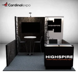 Overhead floor plan of a 10x10 trade show booth showing side walls, seating, tower, and front counter.