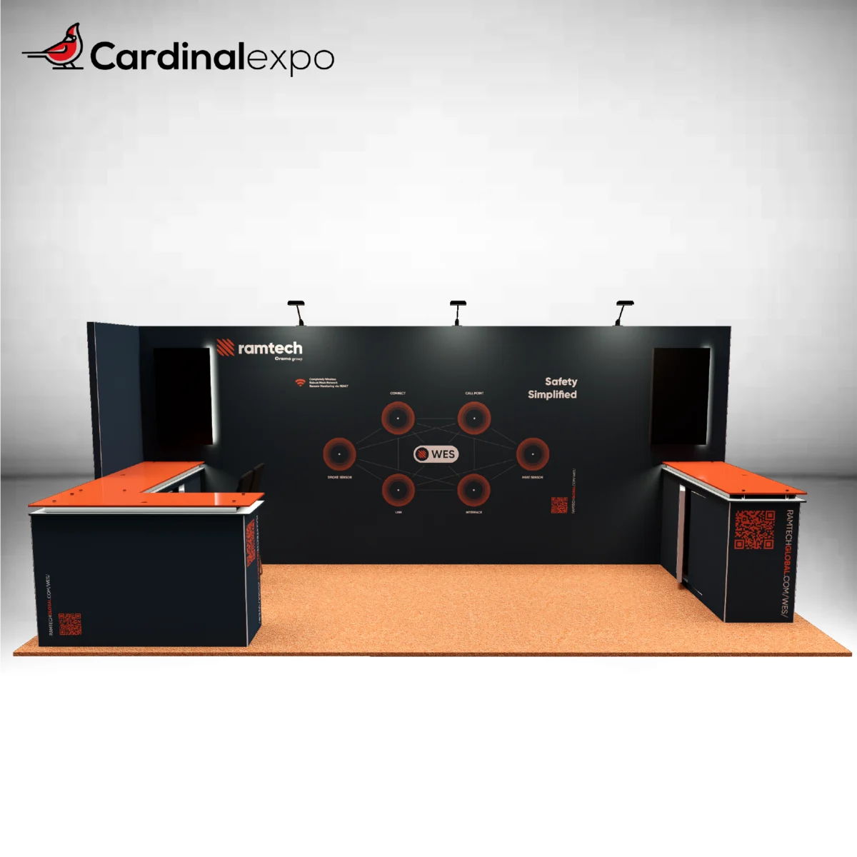 Front perspective of a 10x20 trade show booth featuring orange-topped counters, black backwall graphics, and twin monitors.
