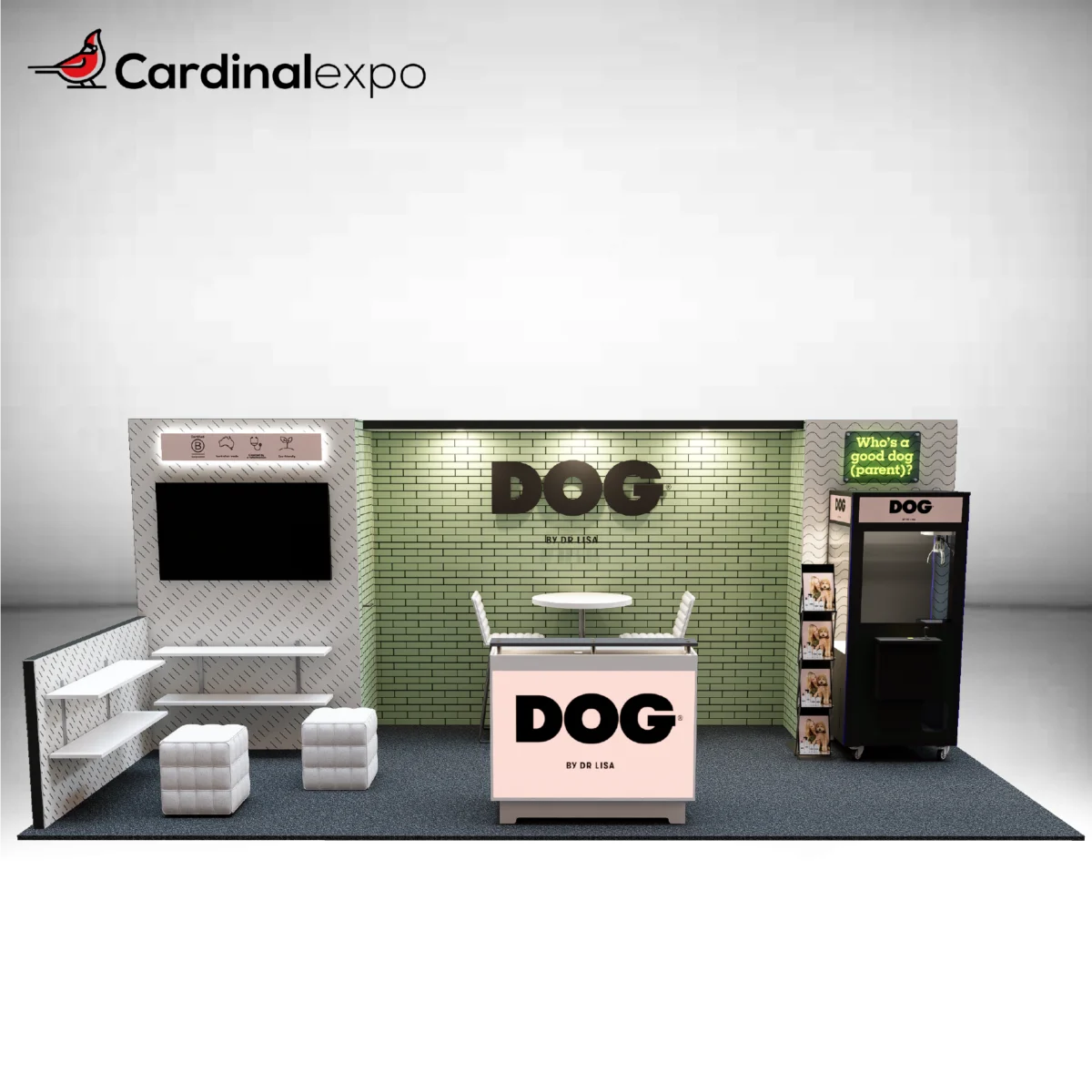 Front perspective of a 10x20 trade show booth featuring a green brick backwall, branded reception desk, television display, side shelving, and a custom claw machine game.