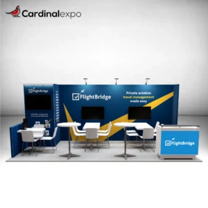 Front perspective of a 10x20 booth with three TV screens, a side workstation alcove, two meeting tables with chairs, and a reception counter.