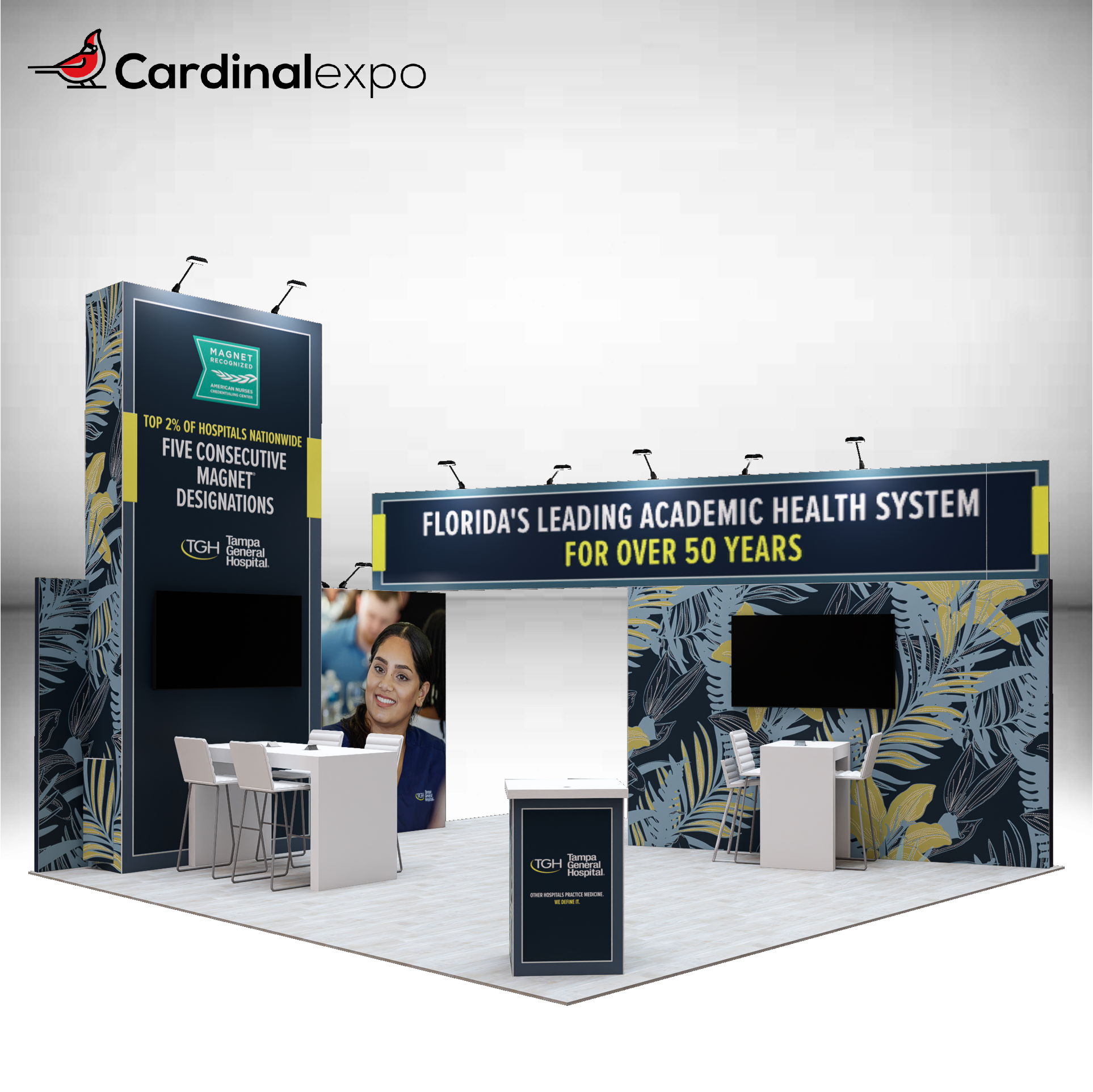 Front-left perspective of a 20x20 trade show booth rental with a tall graphic tower, overhead header beam, TV monitors, high-top meeting tables, and reception desk.