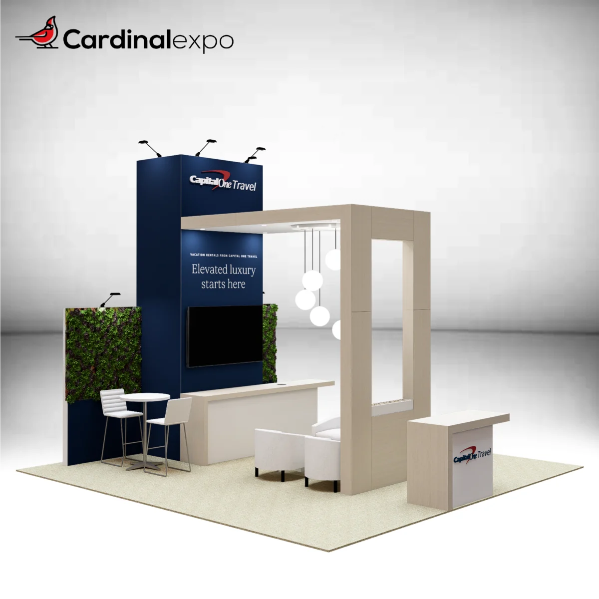 Front-left angle of a 20x20 trade show display rental showcasing a tall blue tower with a 3D backlit logo sign, wood canopy lounge, living green wall accents, TV monitor, and reception desk with a 3D logo sign.