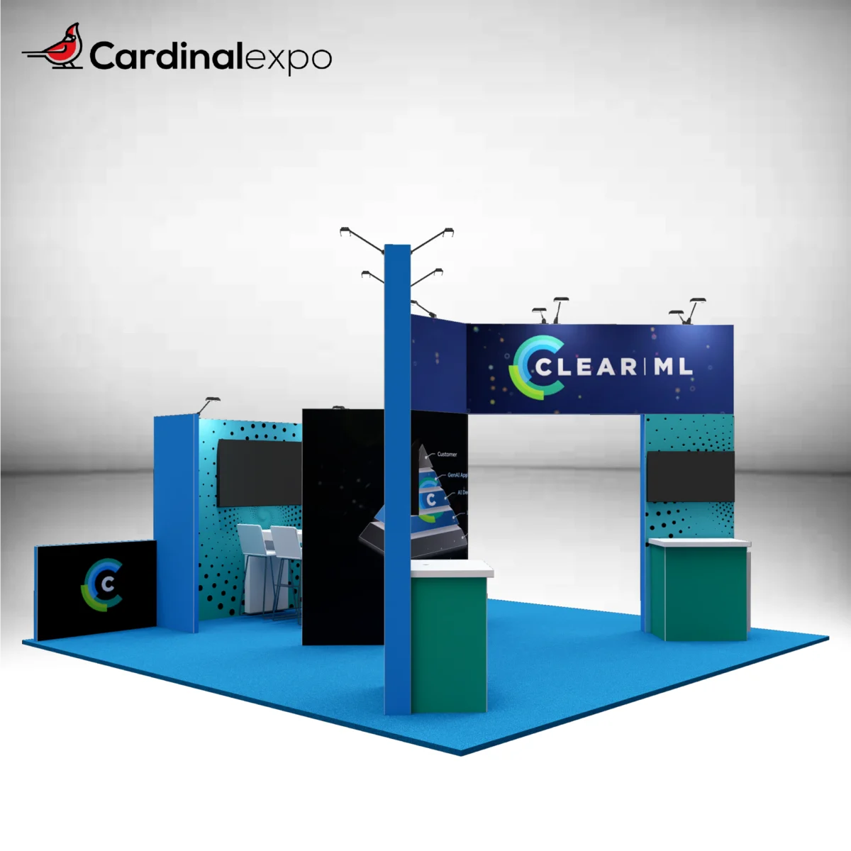 Front-left angle of a 20x20 trade show booth rental highlighting a tall central blue tower, branding archway header, dual demo counters with TV screens, and meeting seating.