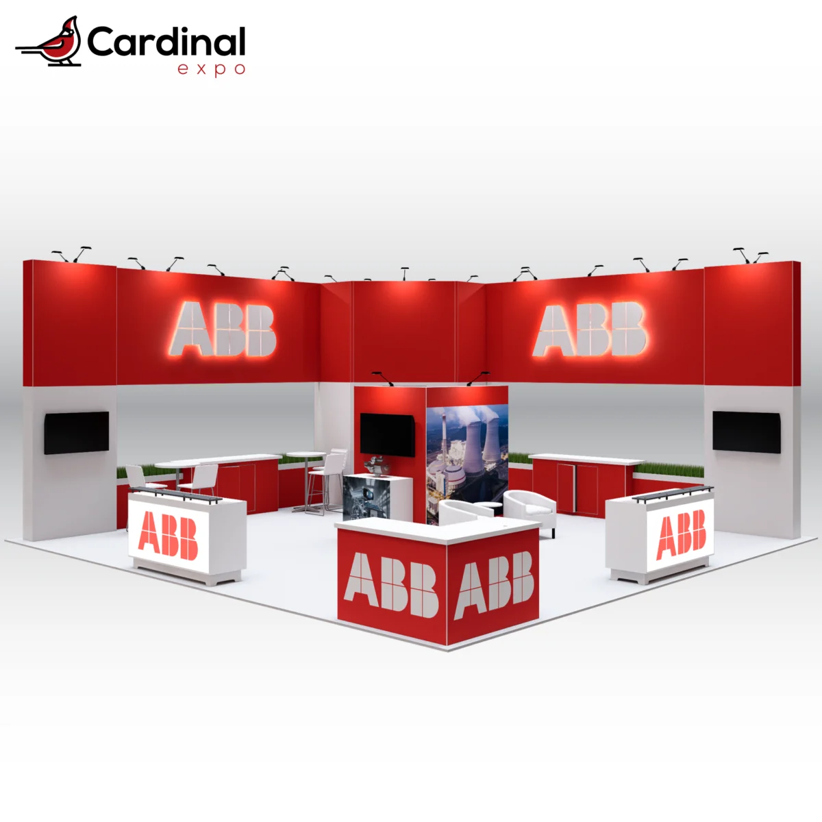 Front-left angle of a large custom trade show booth rental featuring upper headers with 3D backlit logo signs, three reception counters, wall-mounted TV screens, central demo pillar, and high-top bistro sets.