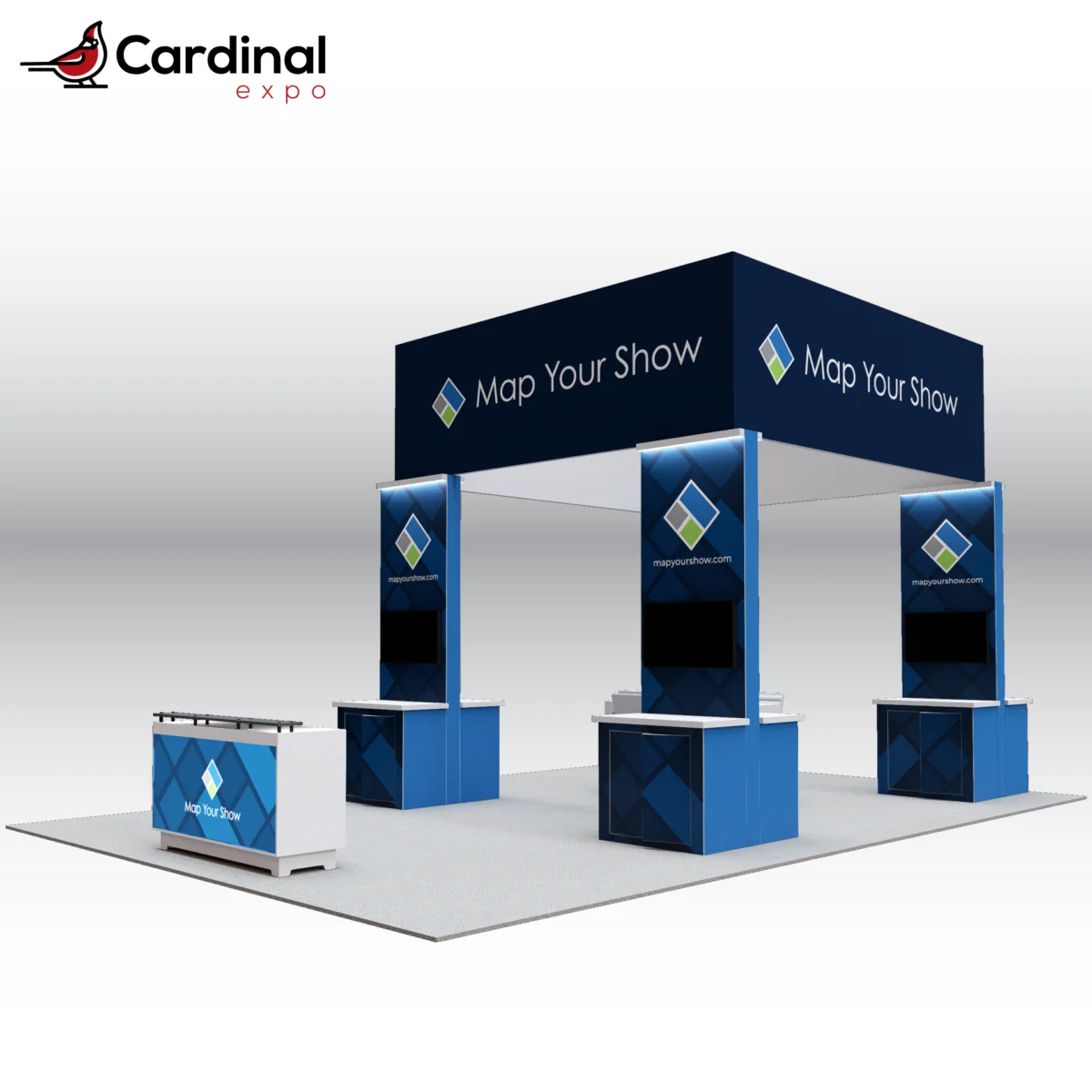 Front-right perspective of a large custom trade show exhibit rental showcasing a prominent square hanging sign, corner towers with wall-mounted TV monitors, storage counters, and front reception desk.